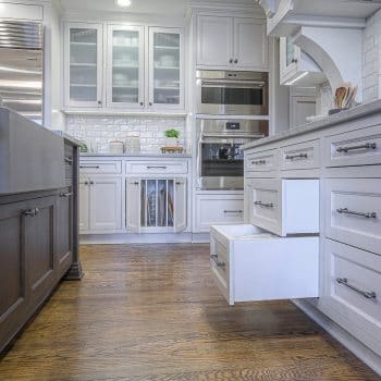 white soft close cabinets in kitchen