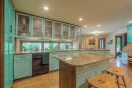 bright green cabinets and island in kitchen kansas city