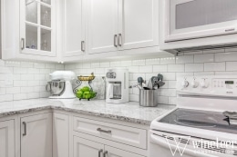 white kitchen cabinets and countertops