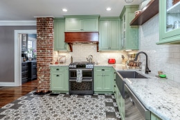 pop of color kitchen cabinets - green with custom tile