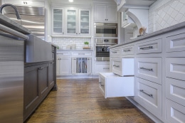 white soft close cabinets in kitchen