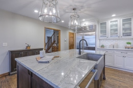 custom lighting and island in kansas city kitchen remodel