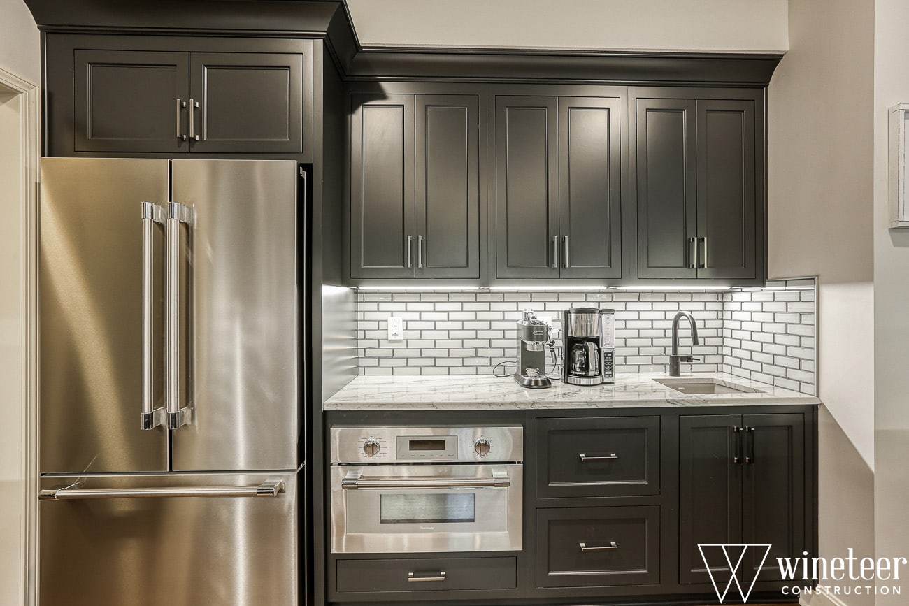 kitchen remodel with custom black cabinetry
