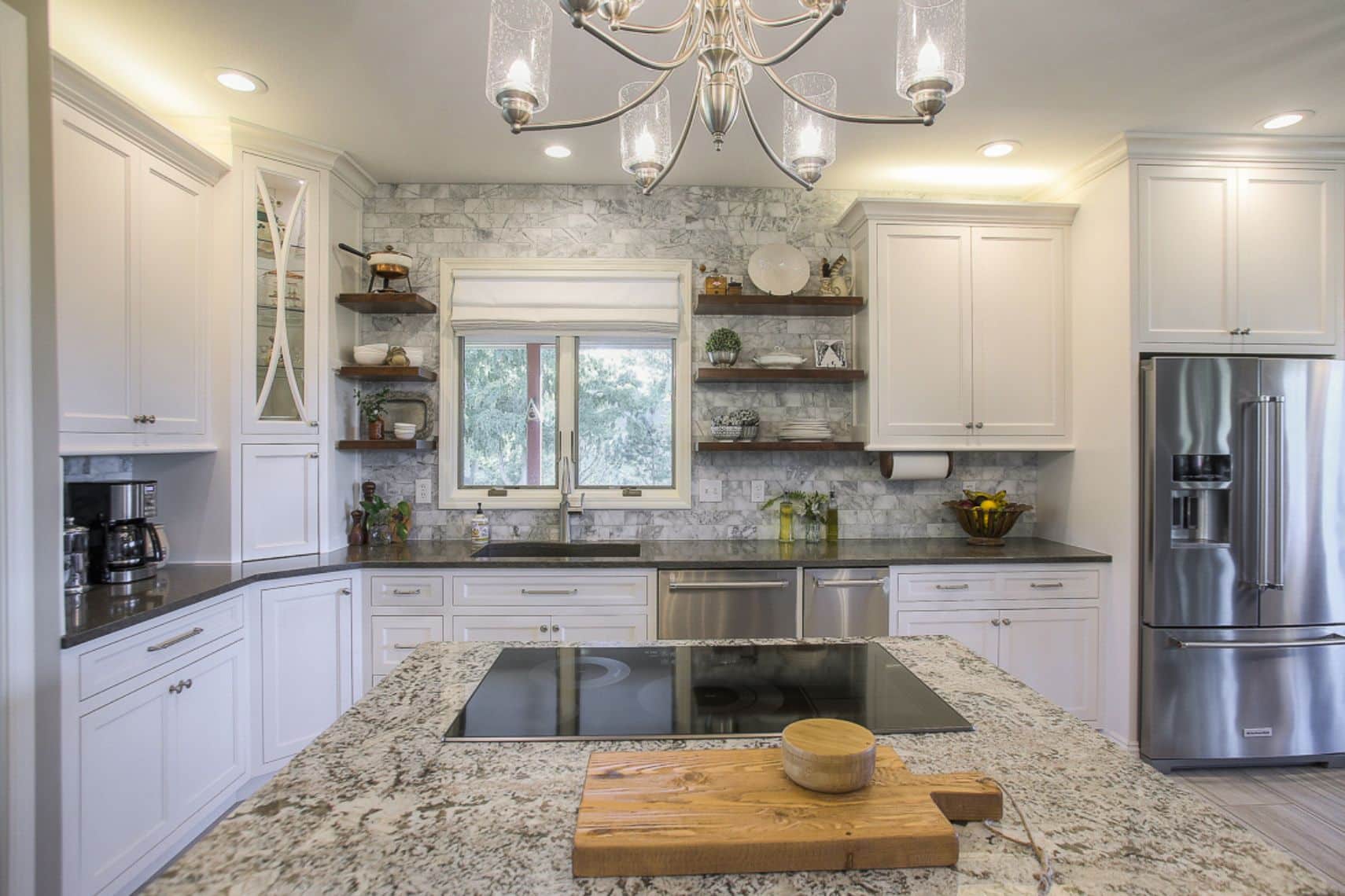 kitchen with gray details and chandelier