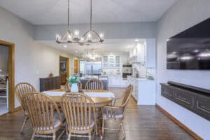 kitchen view from dinning room with pendant lights hanging from ceiling