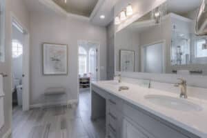 open concept bathroom remodel in grayscale