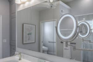 custom vanity and mirror in bathroom renovation