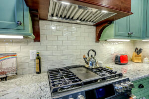 open range and hood in kitchen remodeling project