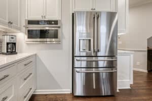 new stainless steel fridge in kitchen