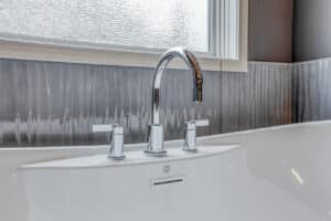 stainless steel faucets and fixtures in bathroom