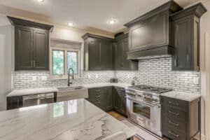 white and gray marbled countertops in kitchen remodel