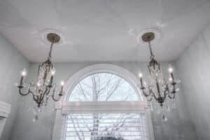 double chandeliers featured in the master bathroom